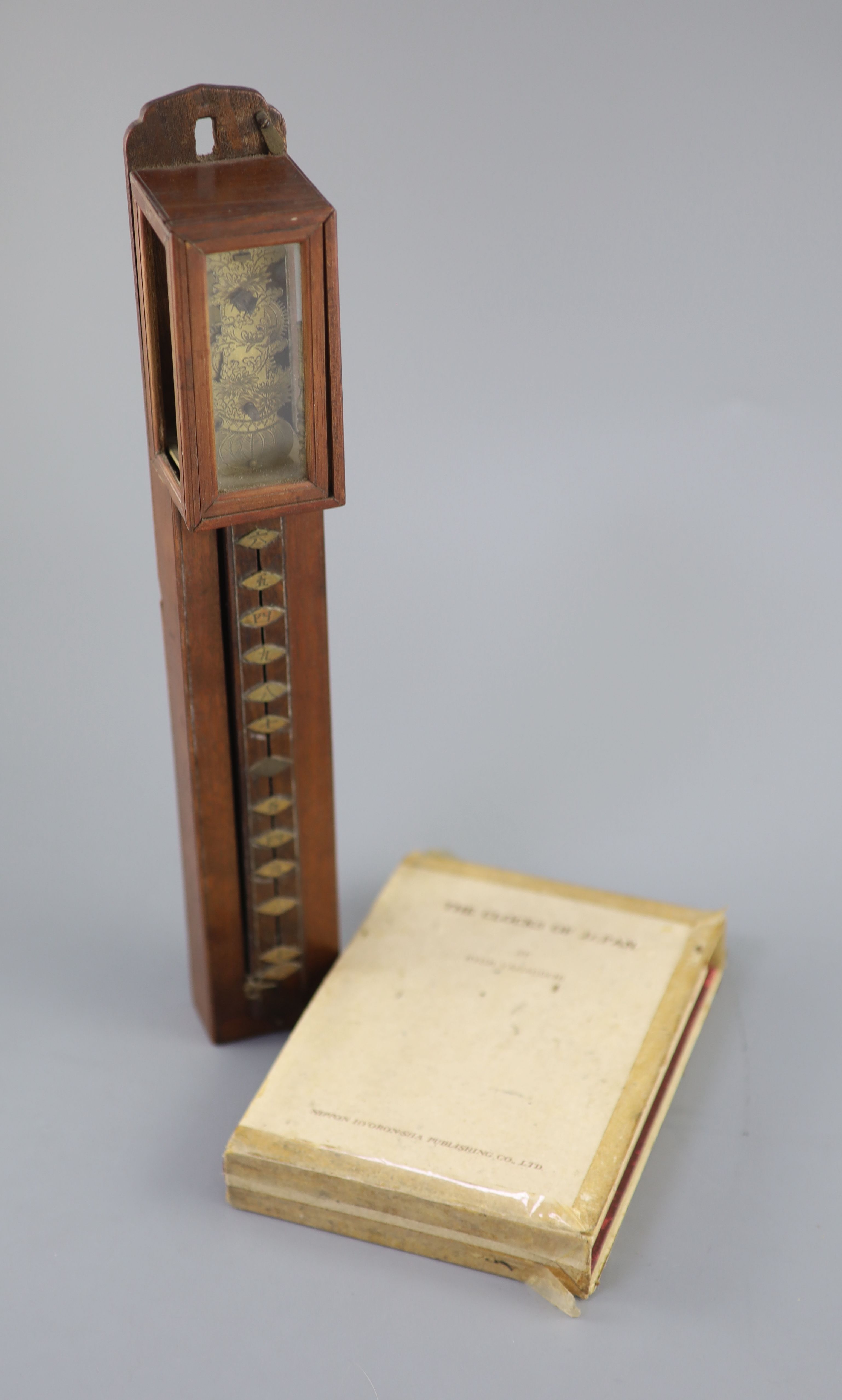 A Japanese shitan wood wall clock, shoku dokei, 19th century, Provenance - A. T. Arber-Cooke